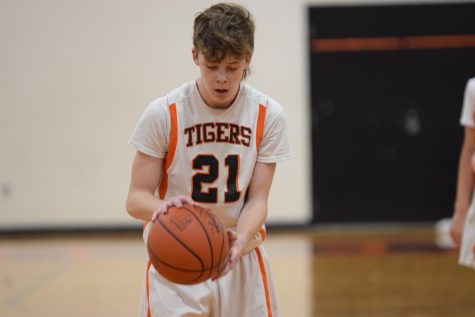Basketball team plays West Geauga